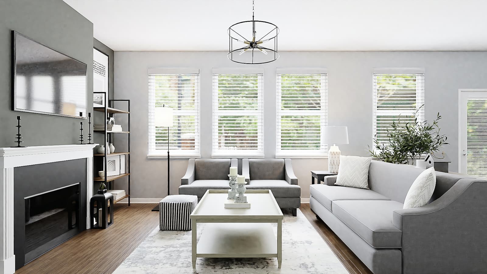 A neutral-toned living room with a fireplace and large windows